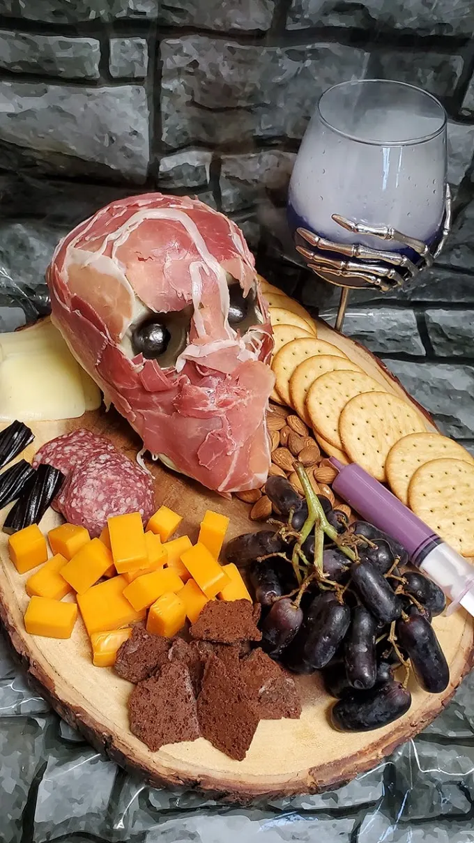 How to make a spooky Halloween charcuterie board complete with prop skull